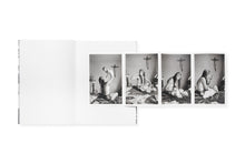 Load image into Gallery viewer, Gatefold showing a sequence of four photos of a young woman with her infant, holding the child aloft on a bed with a crucifix on the wall behind them.