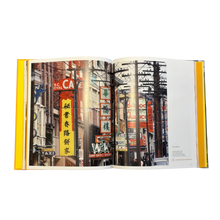 Load image into Gallery viewer, Open book showing images of vintage street signs in Vancouver's Chinatown