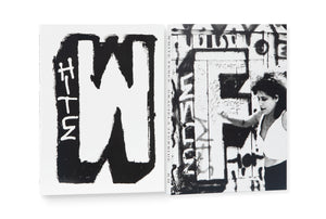 White Fence gang member in front of graffiti wall showing large WF among other tags. This is the book cover inside the slipcase.