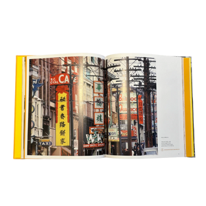 Open book showing images of vintage street signs in Vancouver's Chinatown
